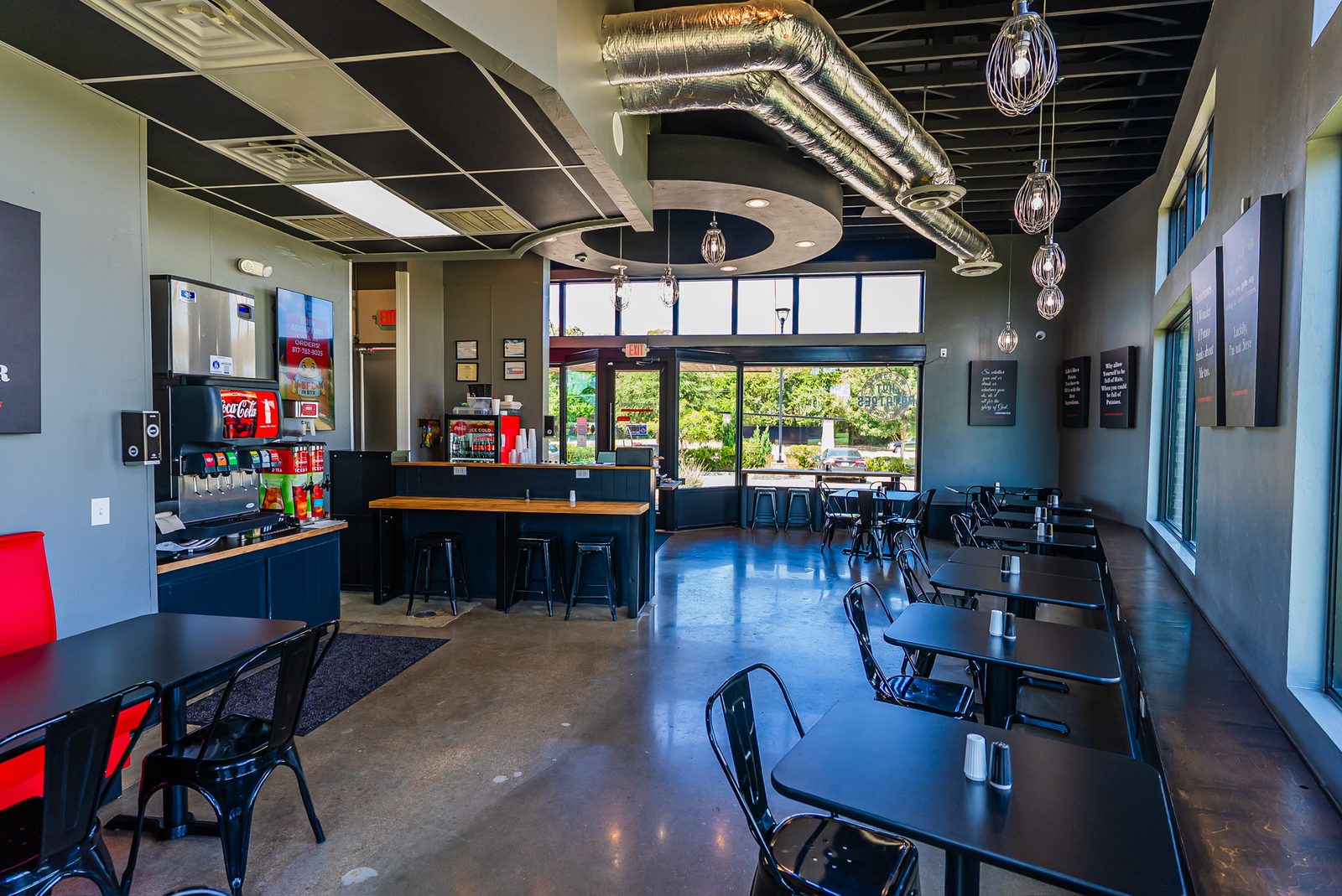 Inside the Burleson dining room — counter seating, drink station and tables